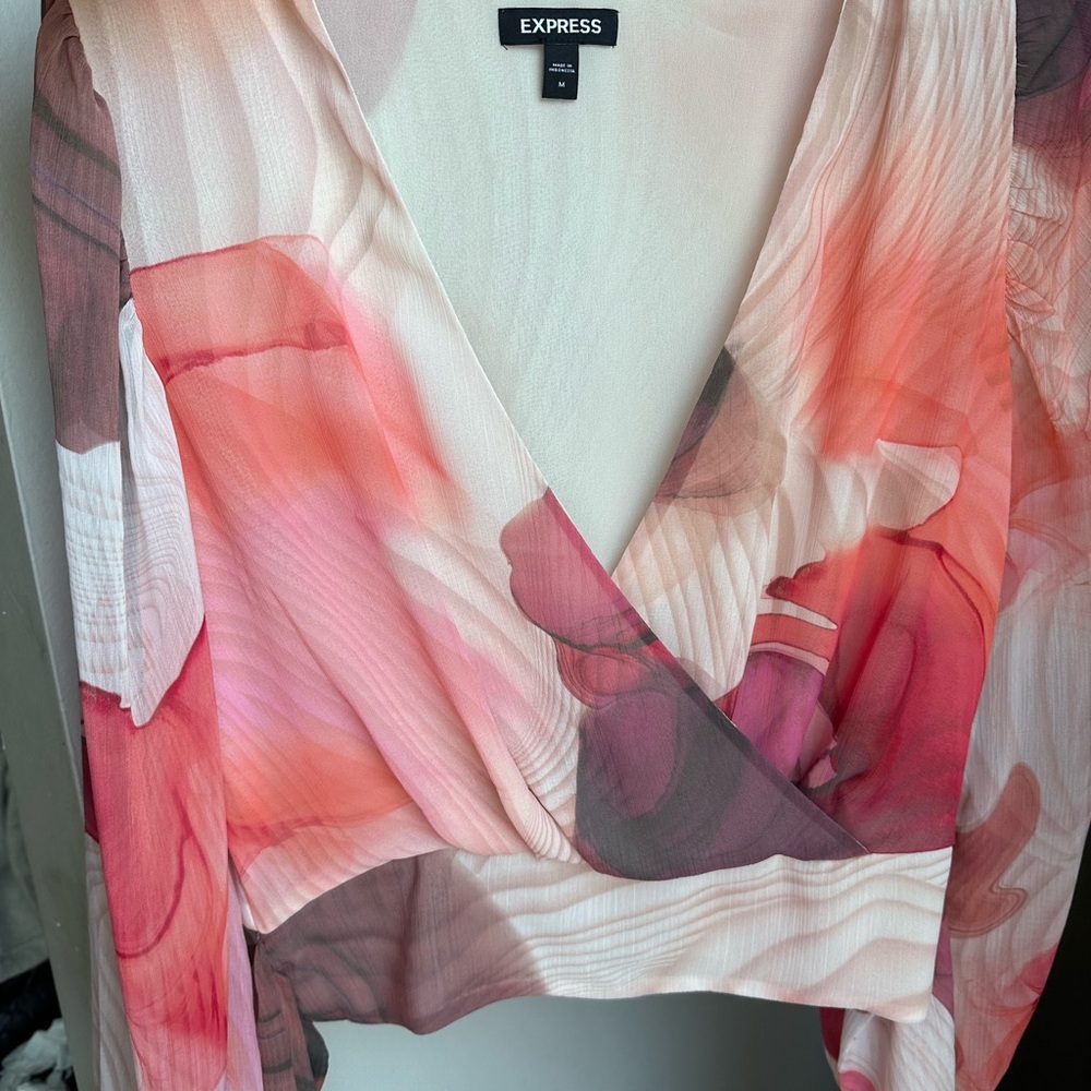Woman’s top , multi pink colors . Worn once